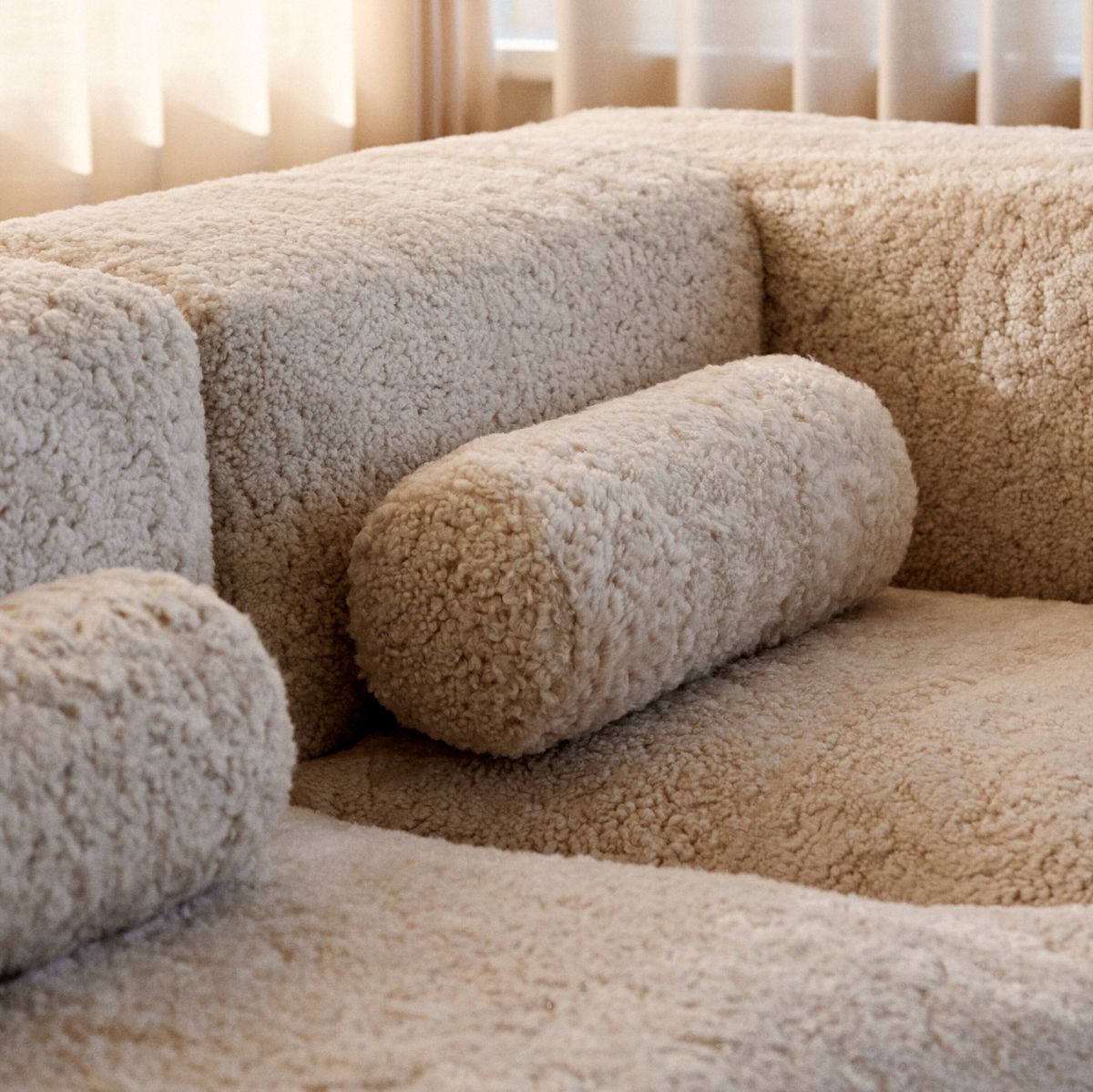 Bolsterpude | Korthåret | New Zealand | Ø20xL52 cm Antracitgrå